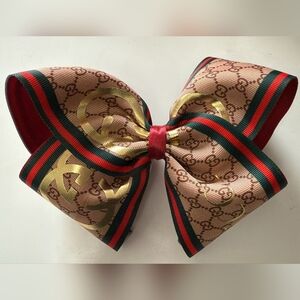 Gucci Women's Gold and Tan Patterned Bow Hair Clip